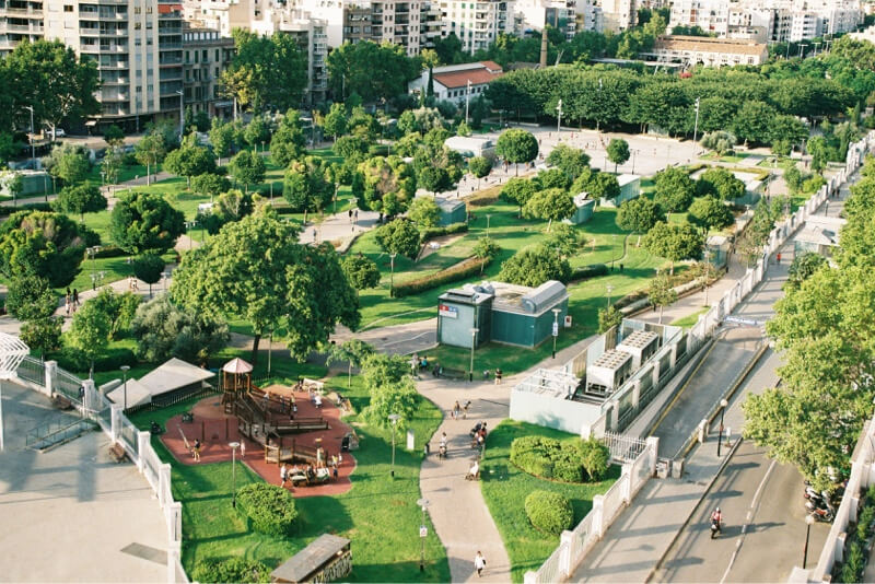 Aerial view of a park nestled in an urban region